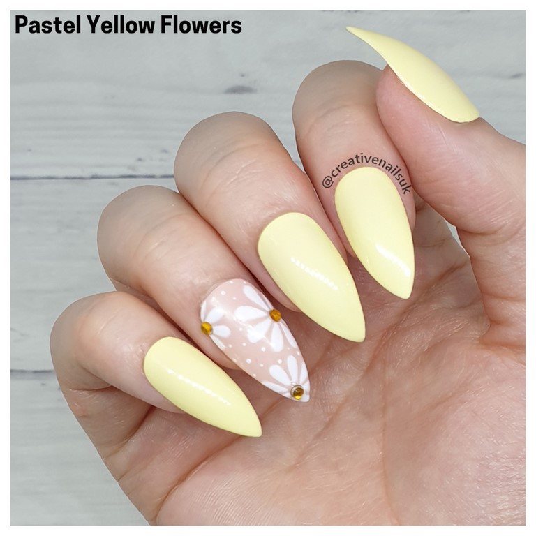 pastel yellow flower nails