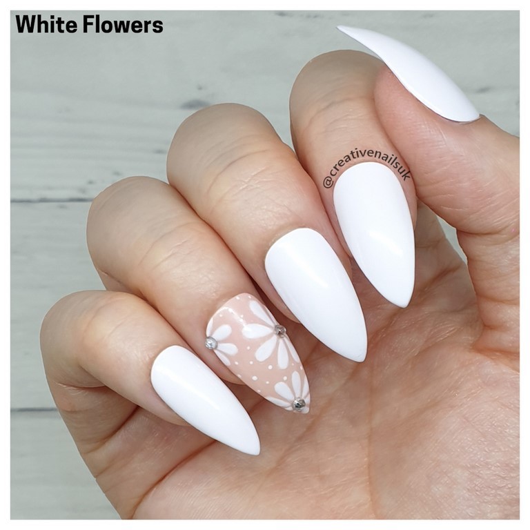 white nails with flowers